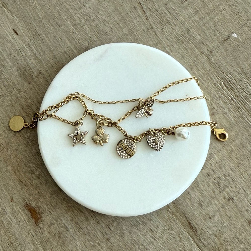 Gold Charm Bracelet with Star and Clover Accents